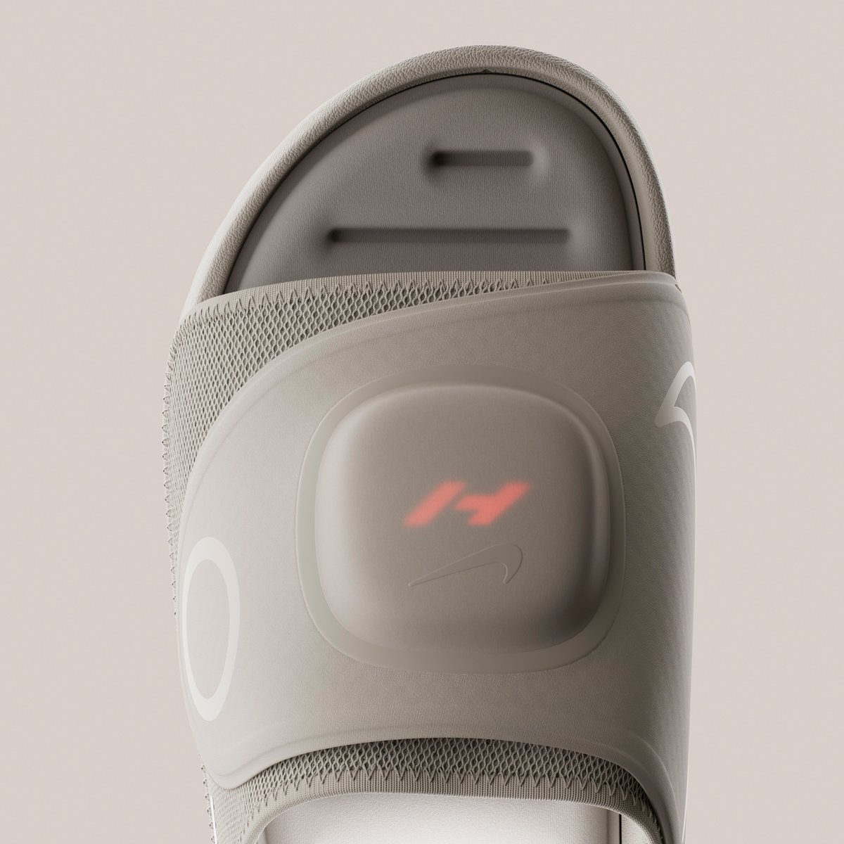 Beige Hyperslide with Hyperice pod and glowing red H logo
